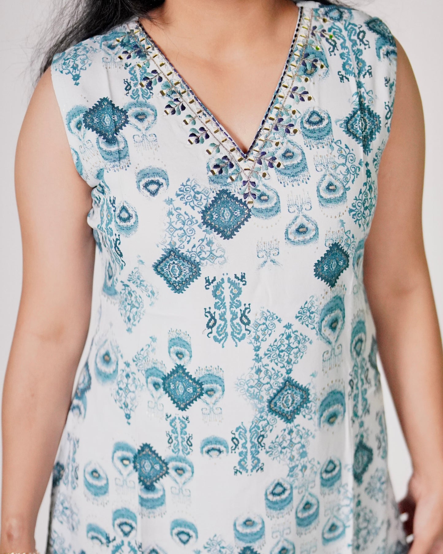 SLEEVELESS EMBROIDED TOP